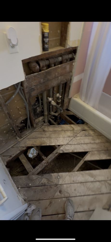 Bathroom floor & plumbing repair — project photo 4