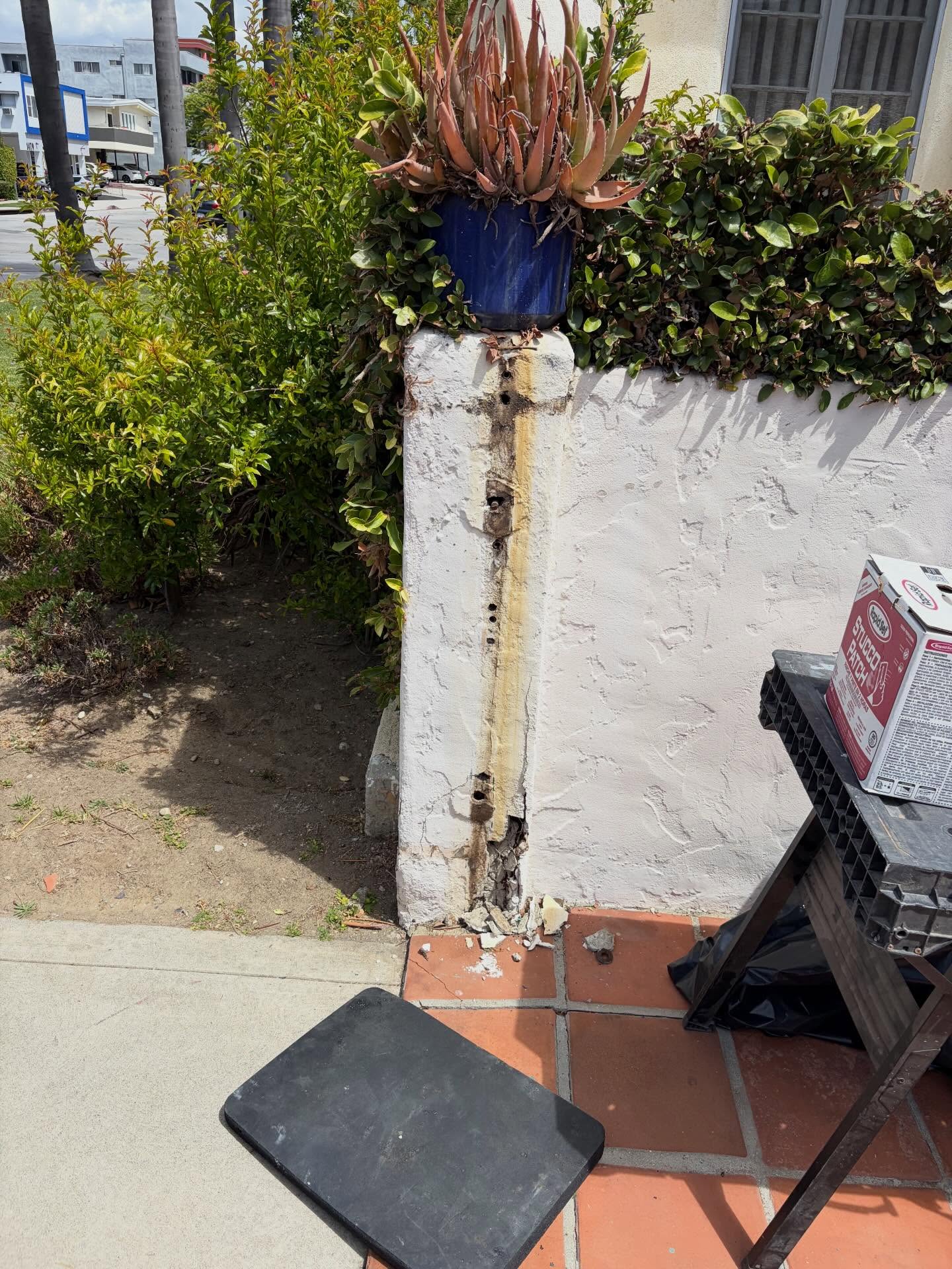 Stucco wall & iron fence restoration — project photo 2